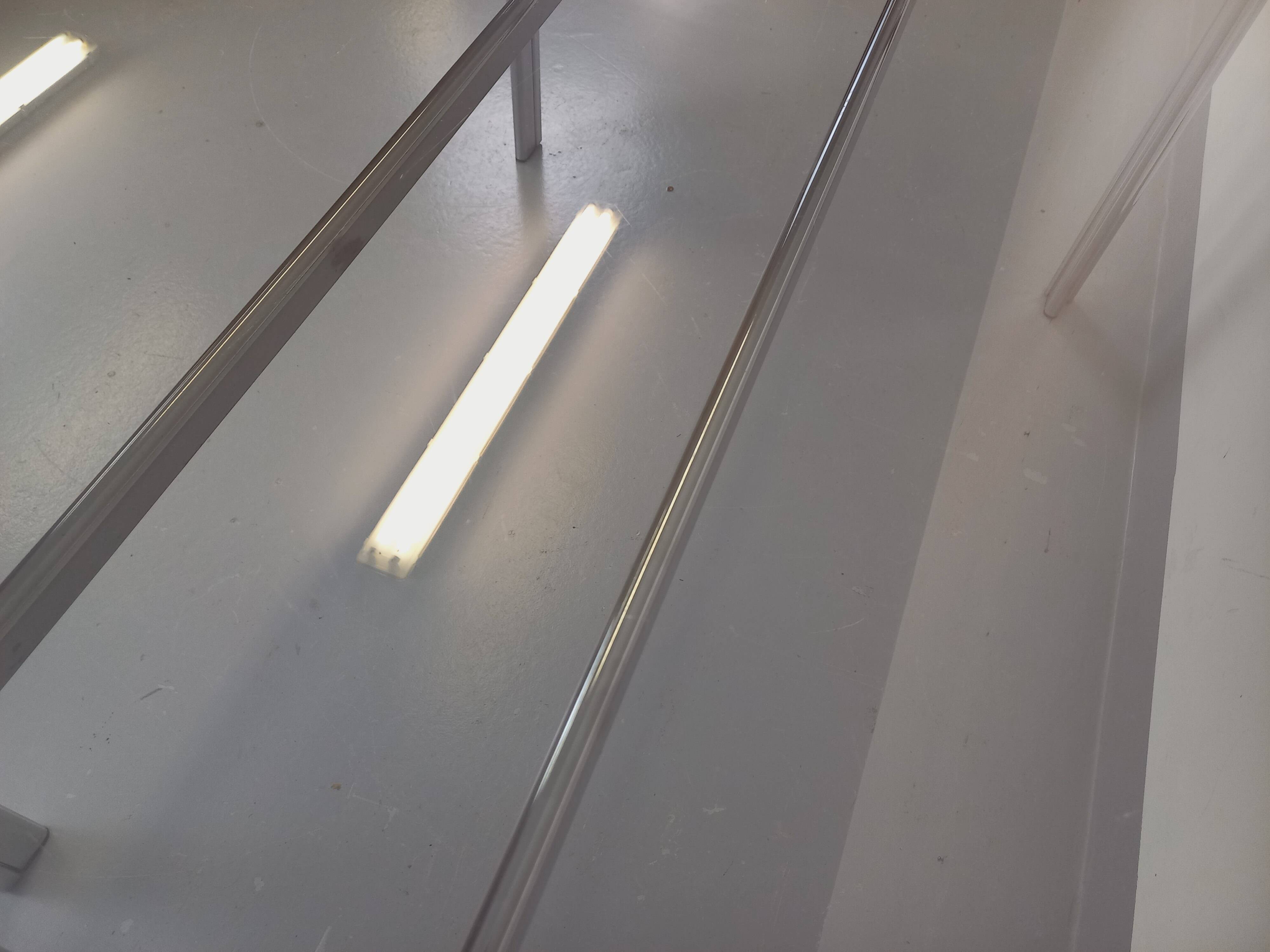 Vintage oval dining table in smoked glass and chrome metal, Space Age style.