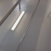 Vintage oval dining table in smoked glass and chrome metal, Space Age style.