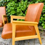 Pair of armchairs from the 50s in brown skaï