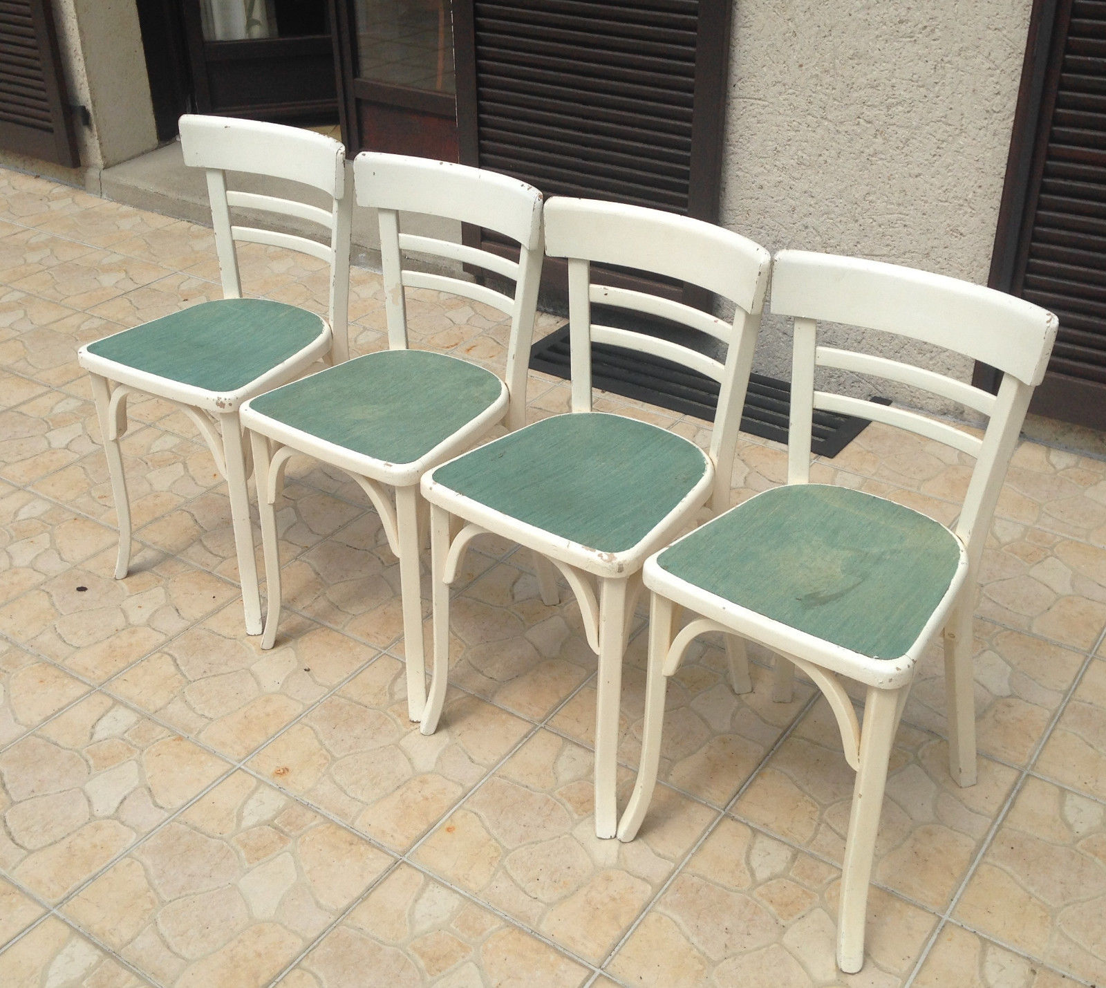 Ensemble de 4 chaises bistrot anciennes des années 50