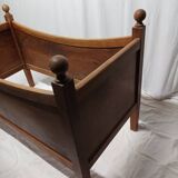 Old wooden children's bed