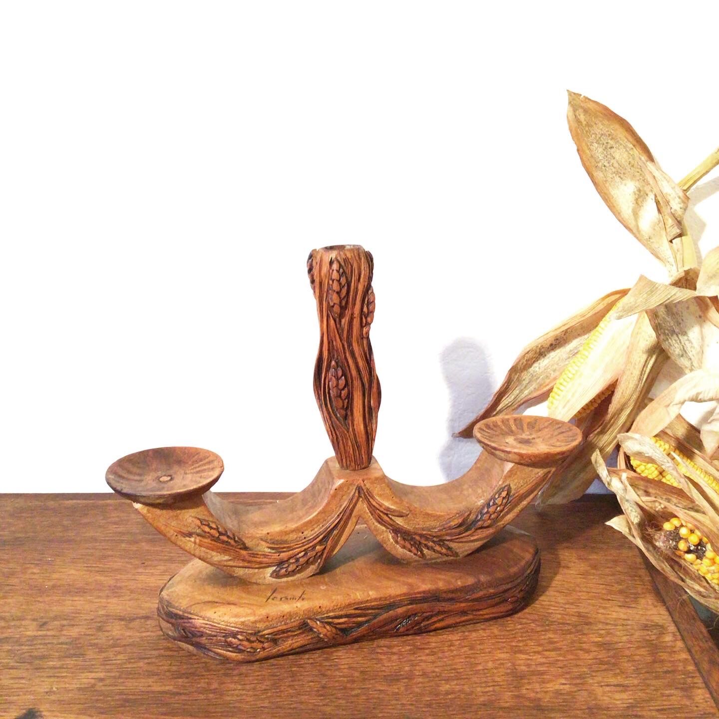 Carved wooden candle holder