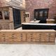 Large workshop furniture transformed into a TV unit.