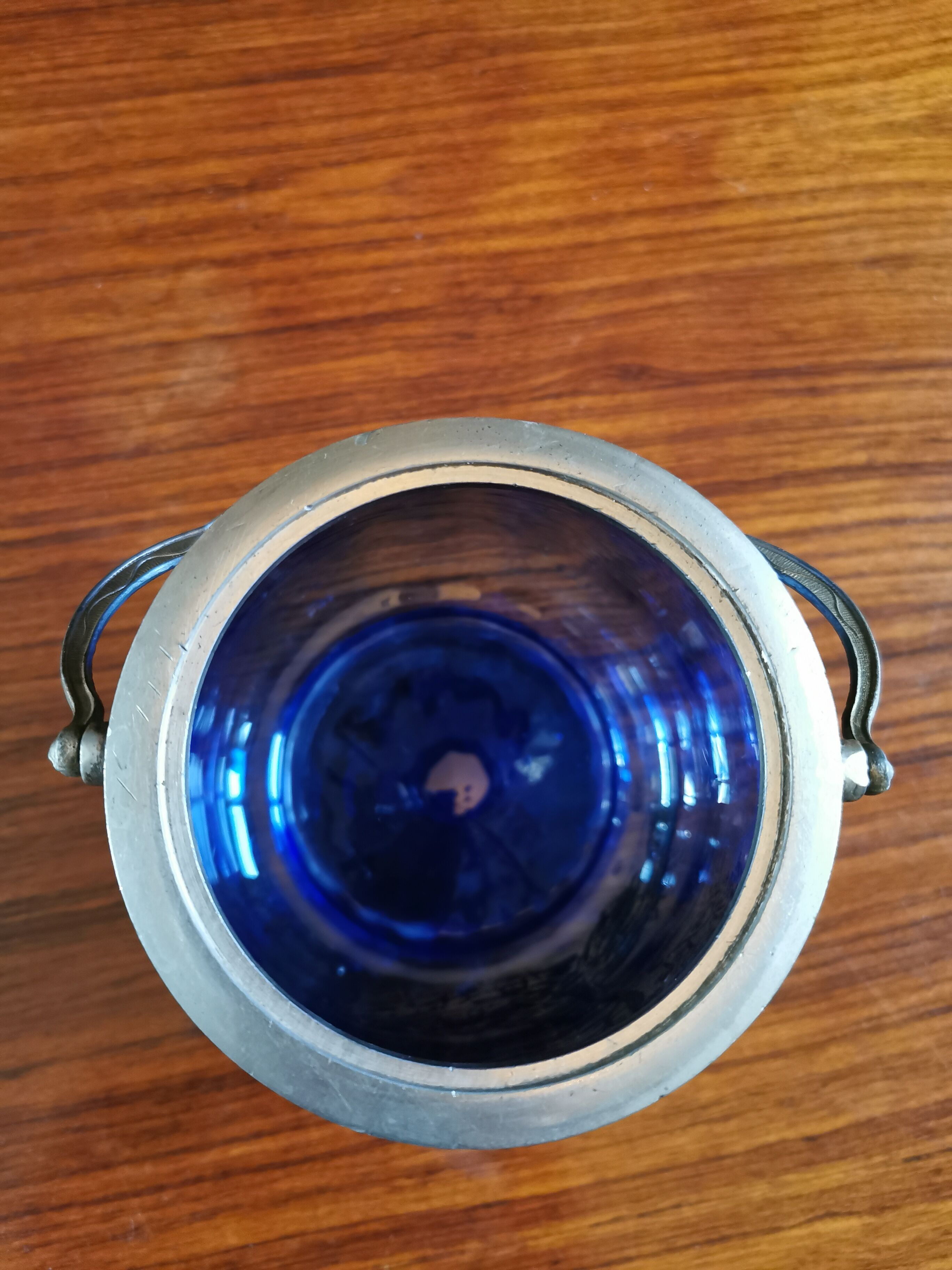 Old ice or biscuit bucket made of golden decor blue glass