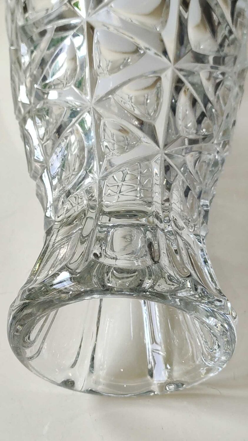 Vintage design vase in crystal. faceted patterns, braces. flared neck