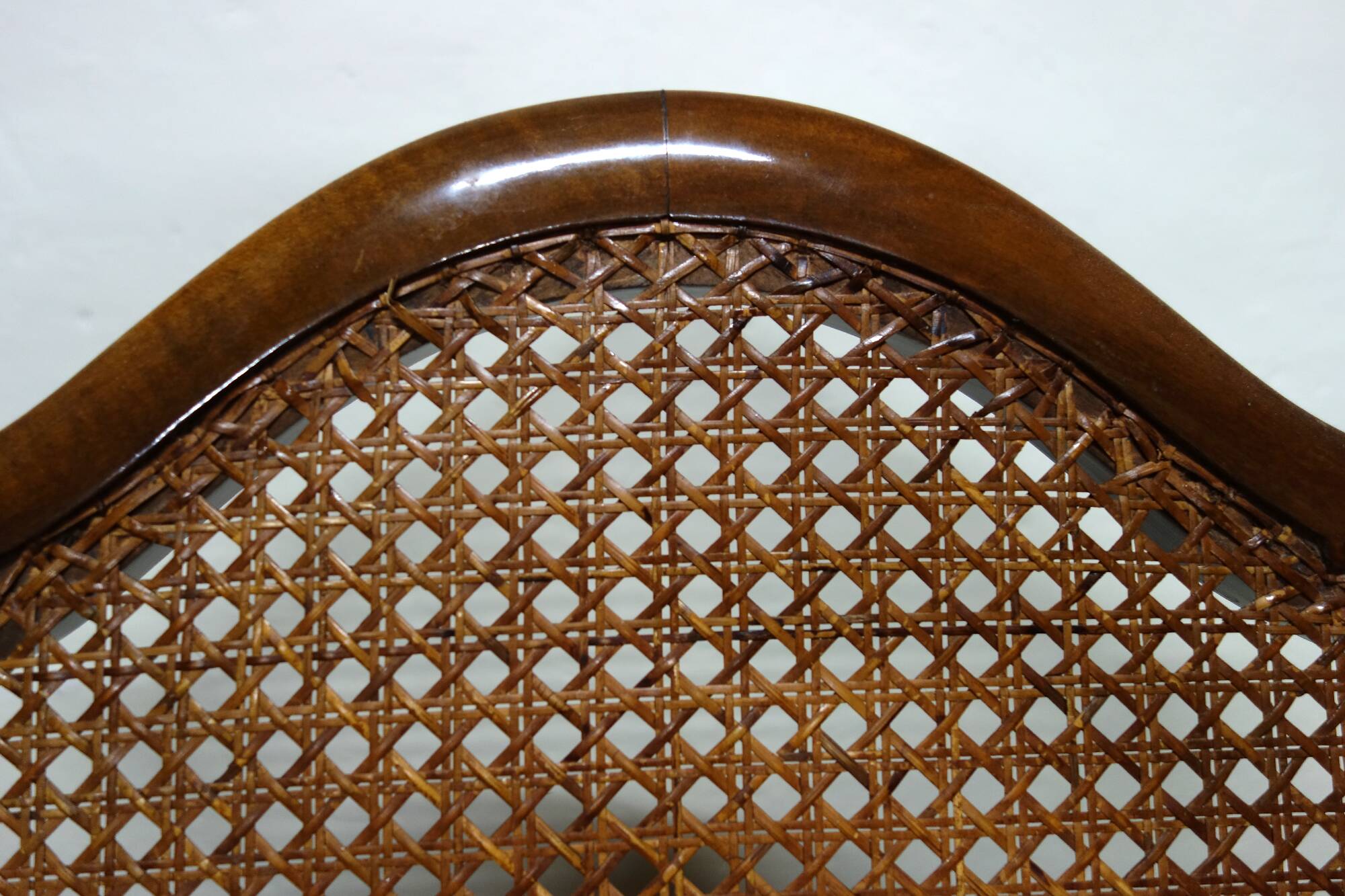 Pair of 1920s caned Chippendale armchairs