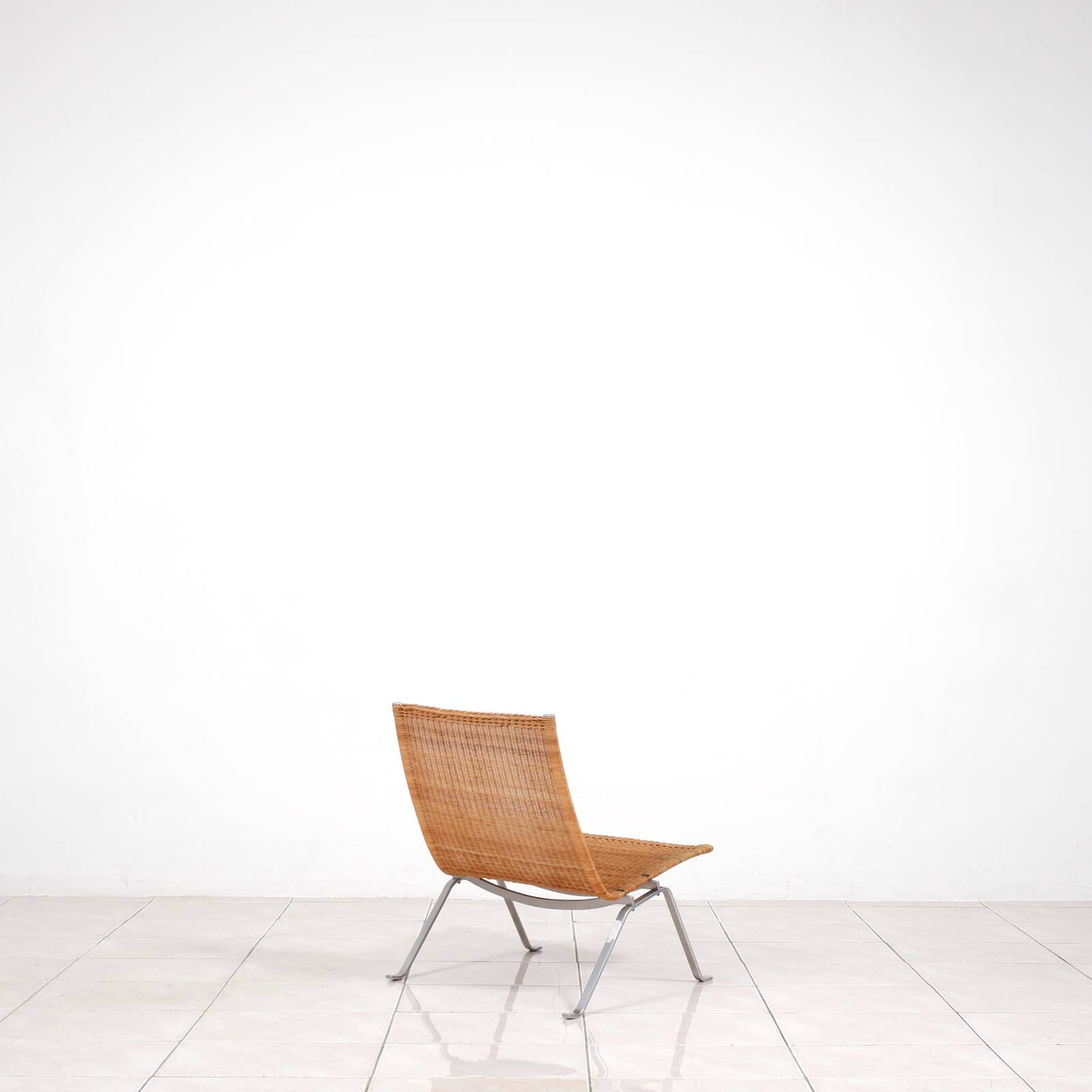 PK 22“ lounge chair in rattan by Poul Kjaerholm for E. Kold Christensen