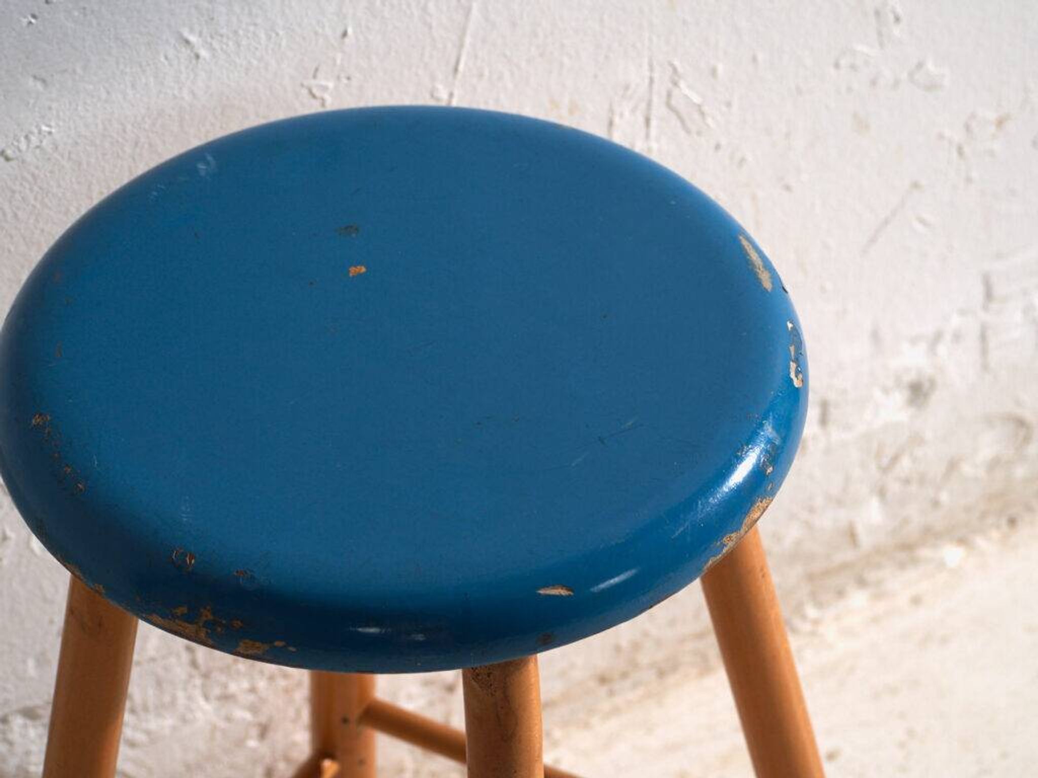 Antique wooden stool with a round seat – Central Europe, around 1950