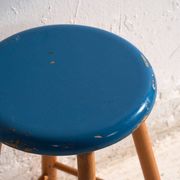 Antique wooden stool with a round seat – Central Europe, around 1950