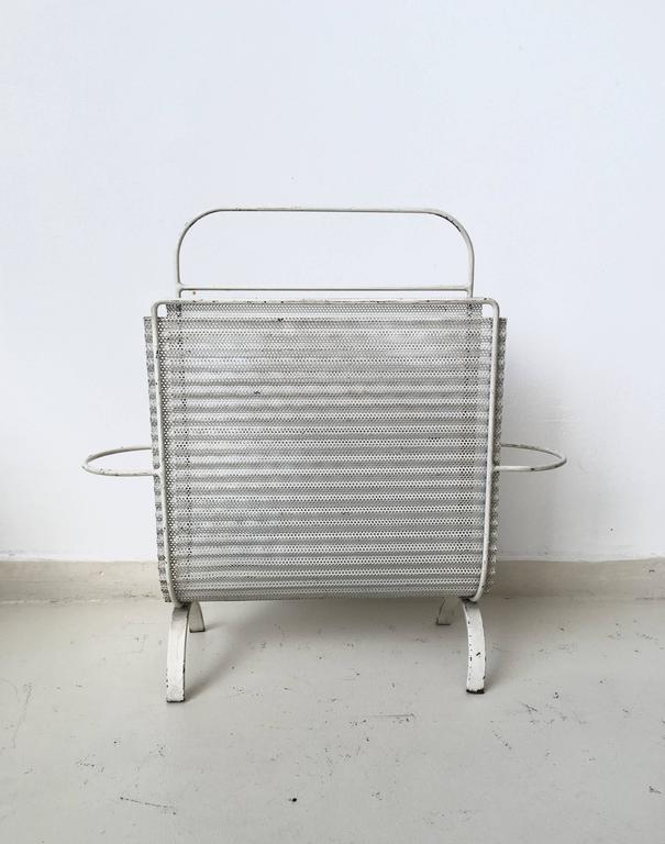 Modernist magazine rack by Mathieu Matégot to 1952