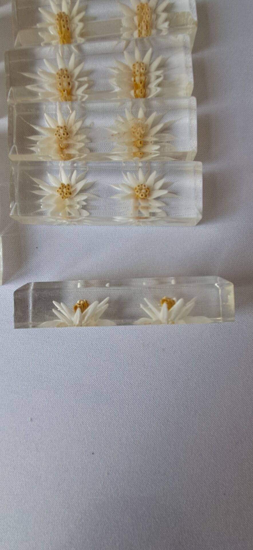 12 knife rests with resin inclusion. 1970s.
