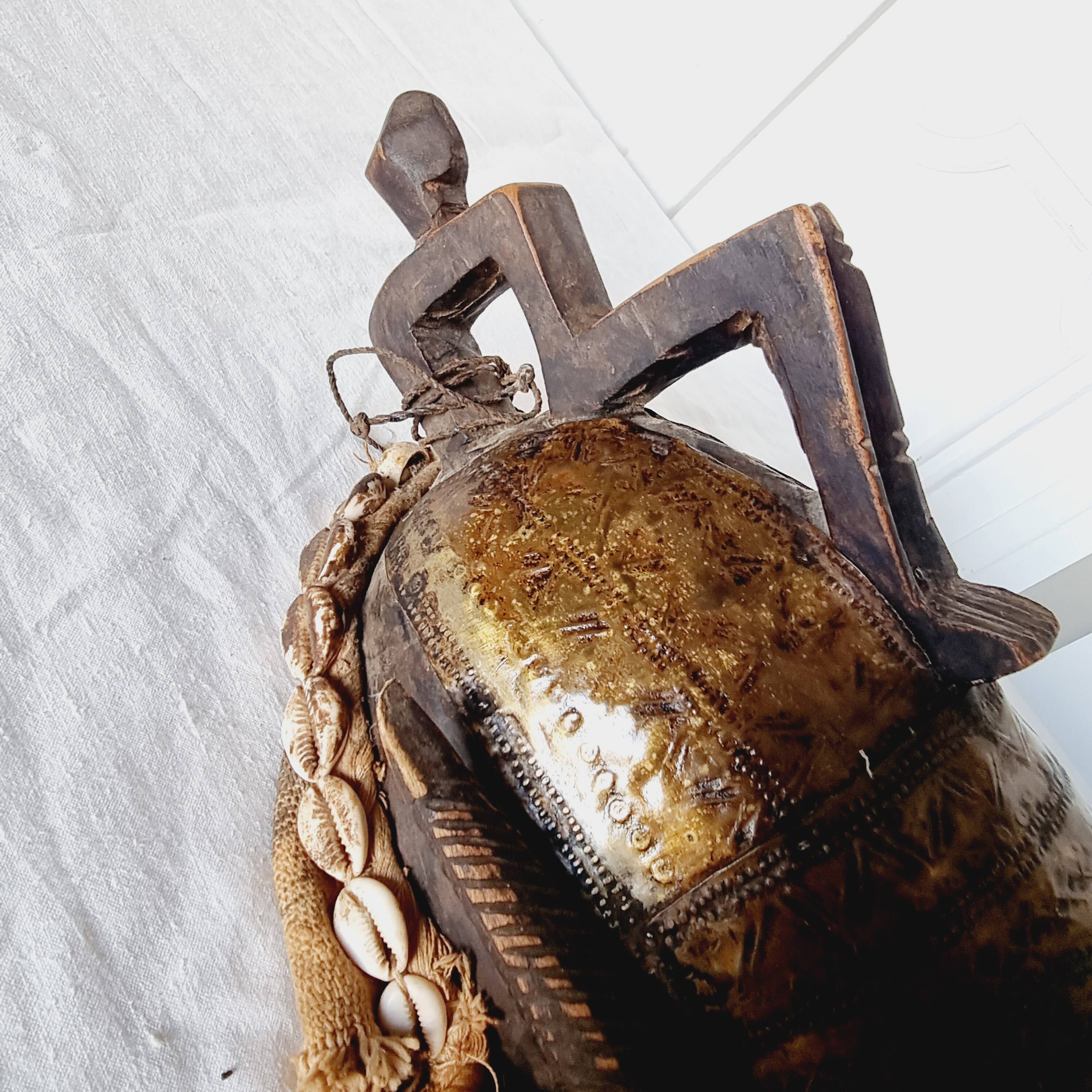 African mask from Mali from the N'Tomo tribe of Marka covered in chiseled brass