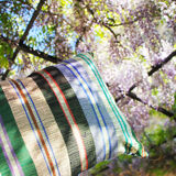 Cushion with stripes and wax