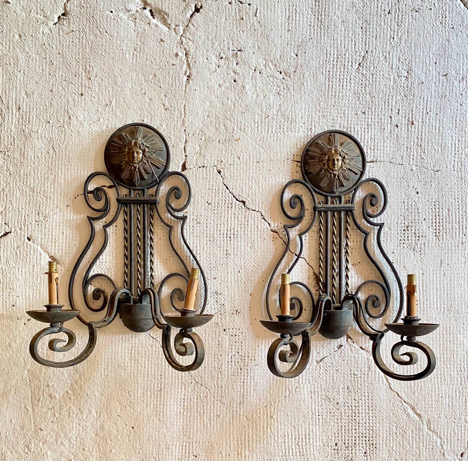 Pair of neoclassical wrought iron wall lights