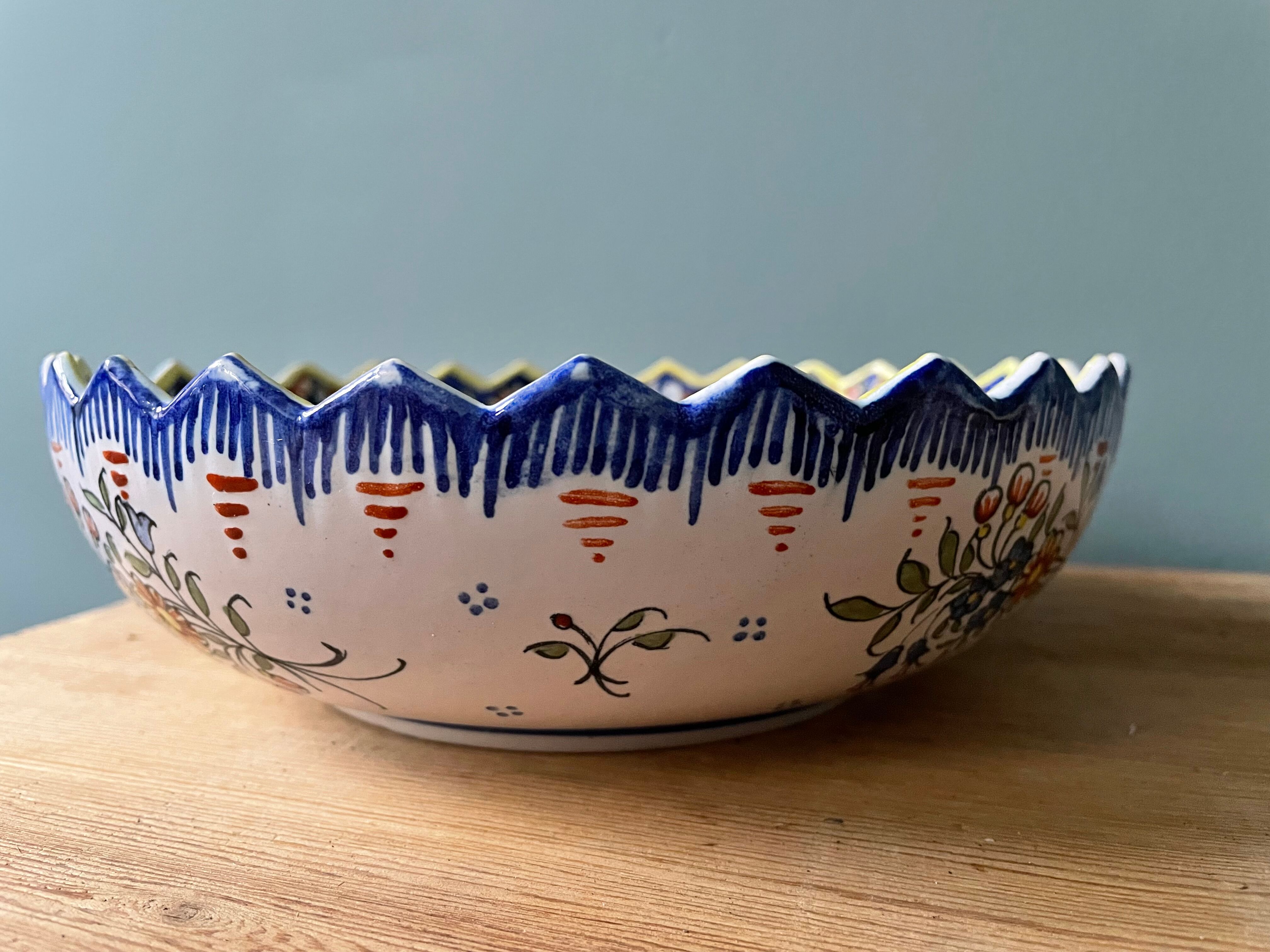 Hollow round dish in Rouen earthenware