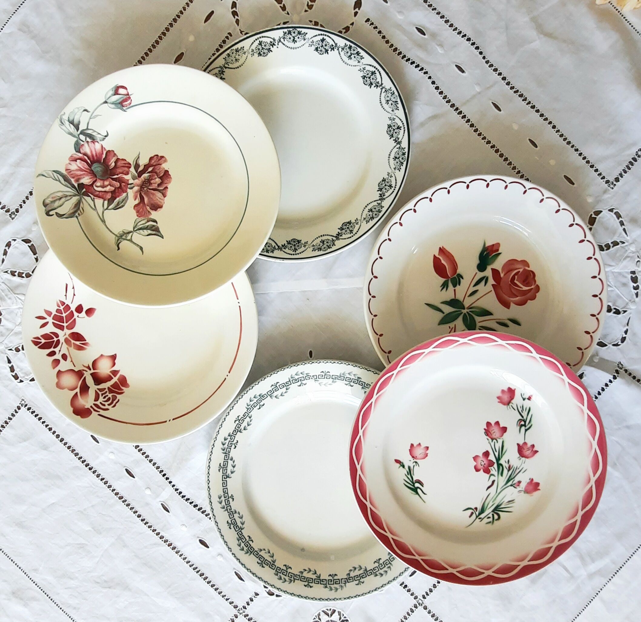 Old flat plates mismatched in earthenware