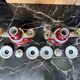 Pair of Limoges porcelain candlesticks with hand-decorated decoration – red and gold