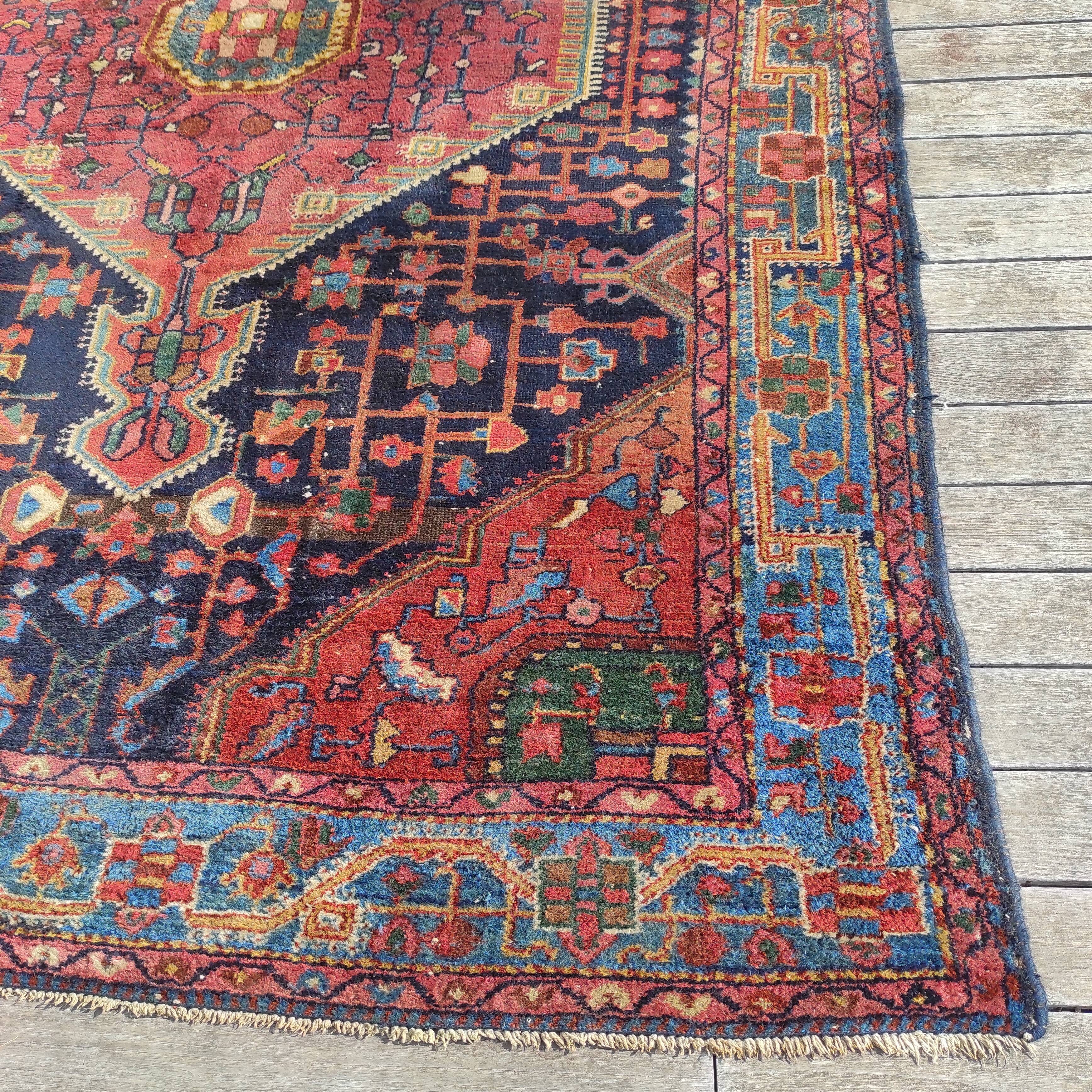 Old Persian carpet 1.62 m wide and 2.33 meters long