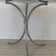 Table for 4 people in smoked glass and metal, 1970.
