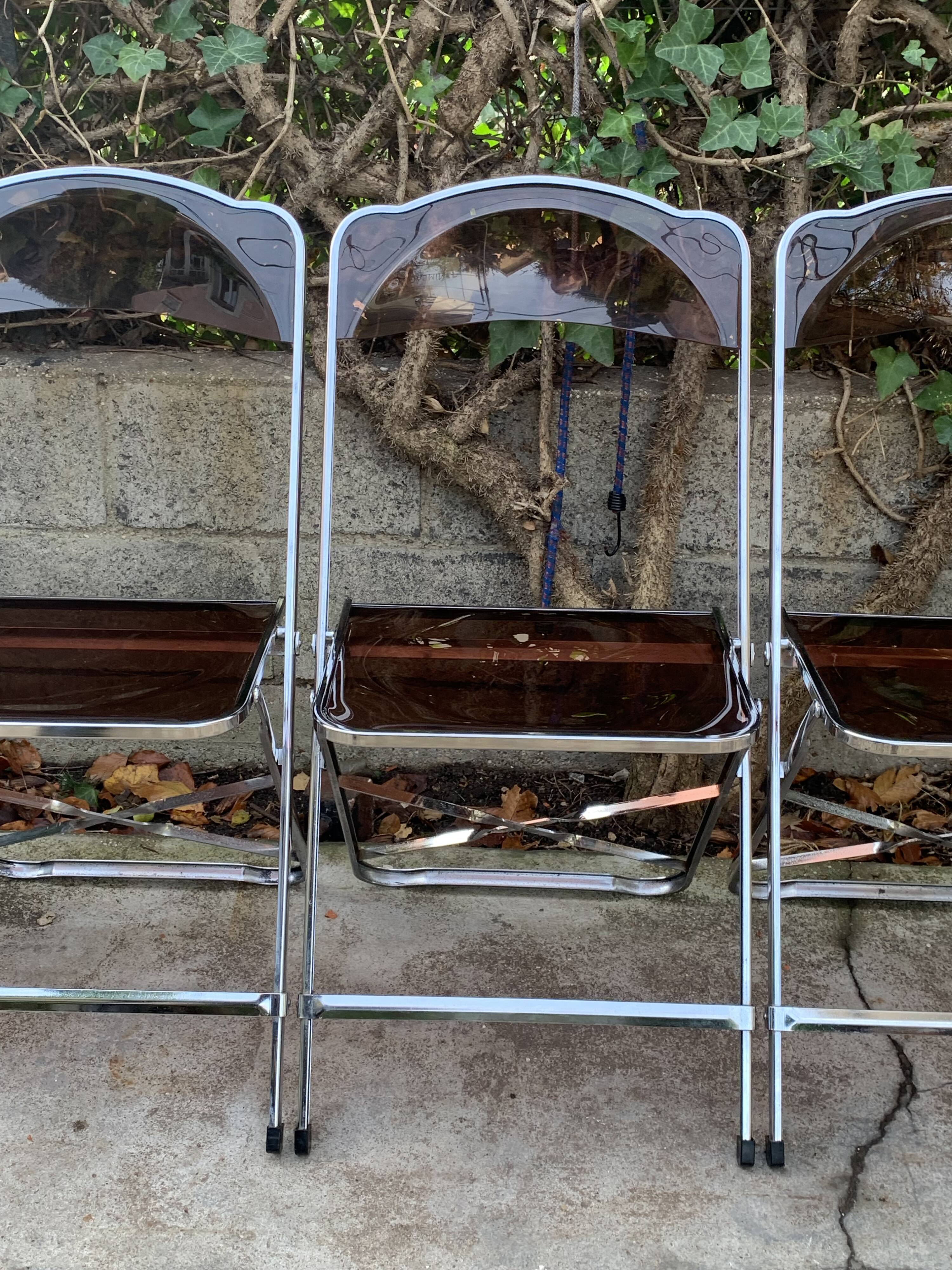 6 chaises pliantes en Plexiglas fumé et métal chrome Chaisor 1970