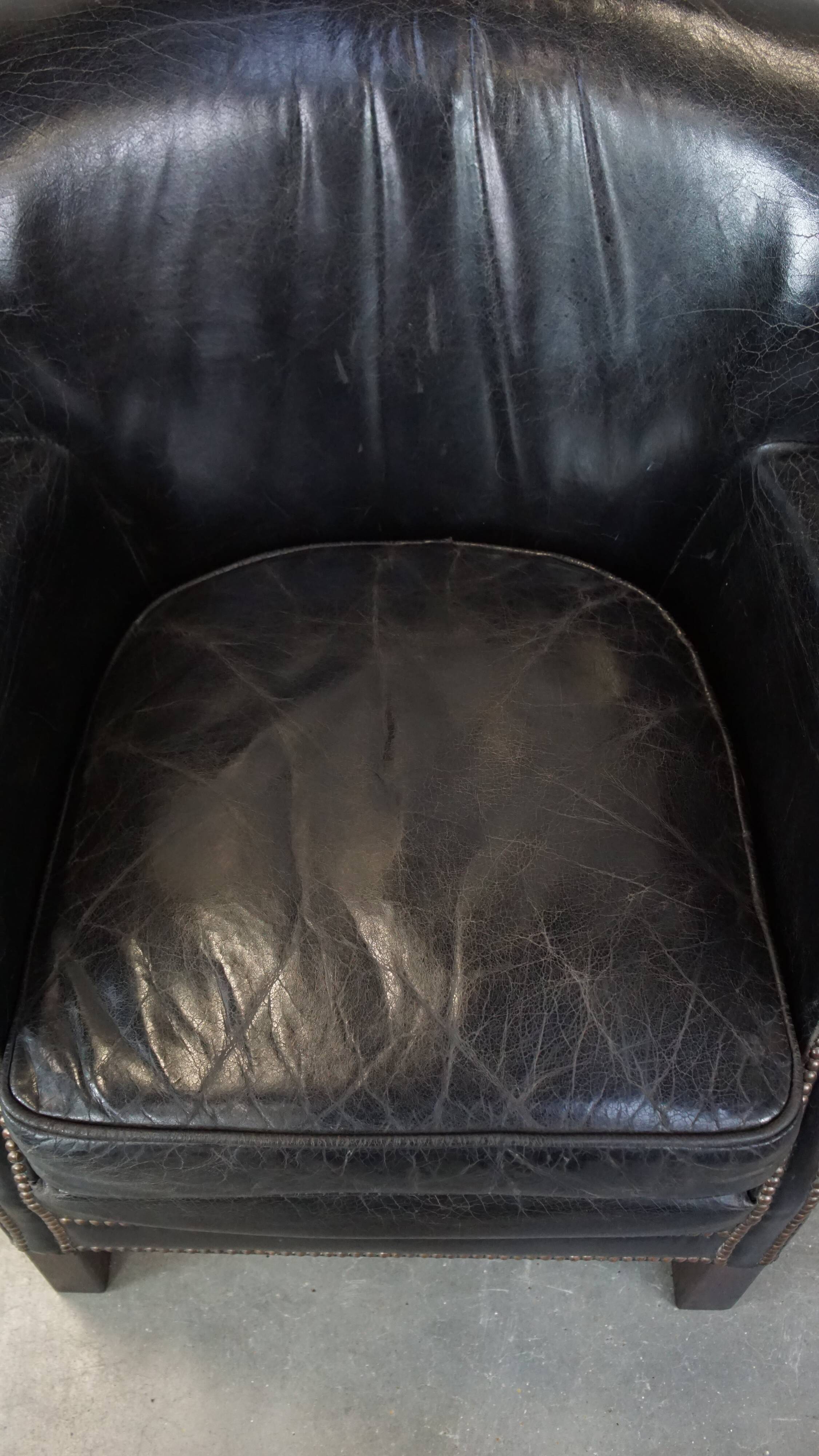 Fauteuil en cuir de vachette noir