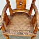 Hand stabbed teak armchair