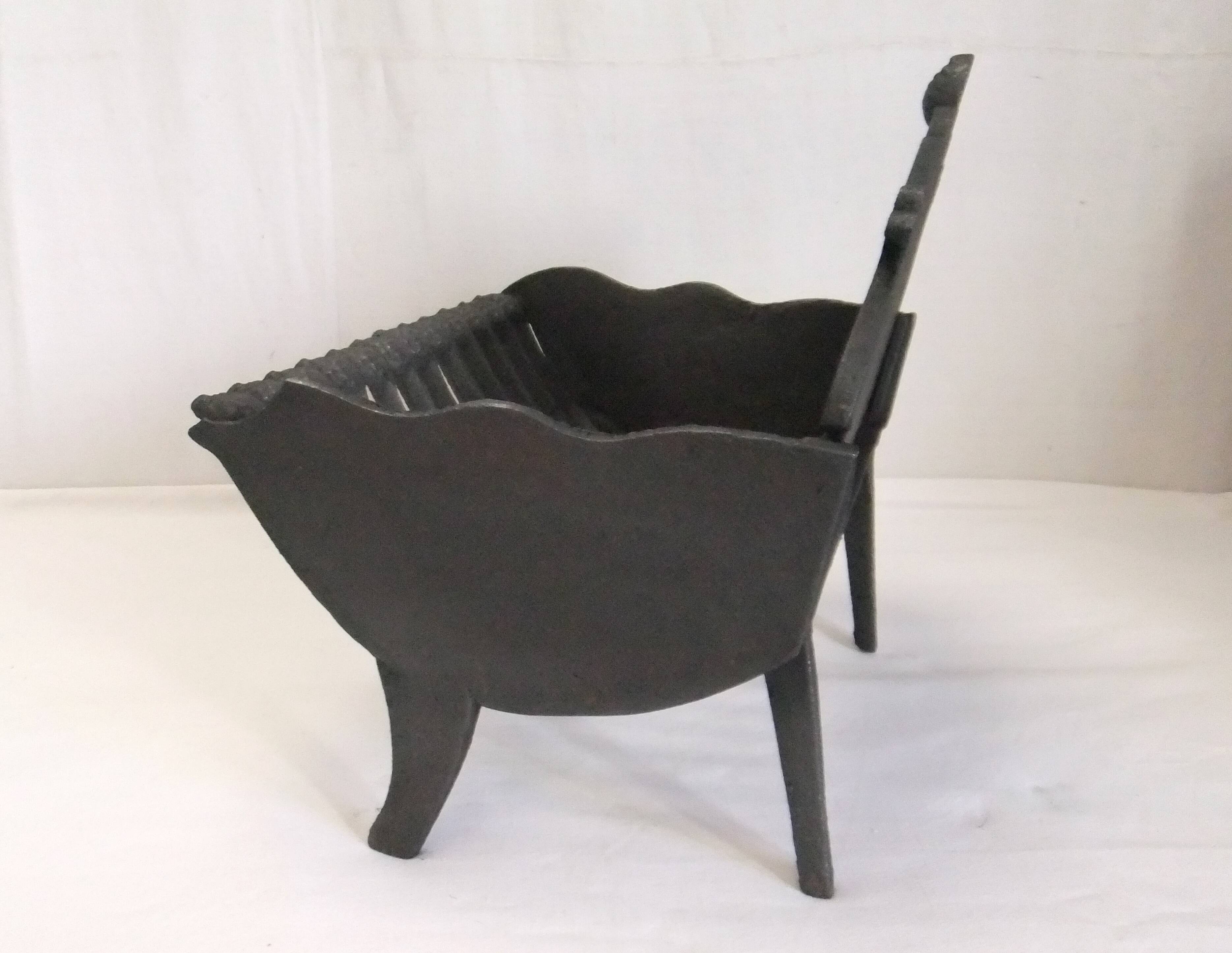 Old cast iron log holder andiron fireplace cornucopia pine cone