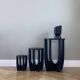 Three wooden side tables