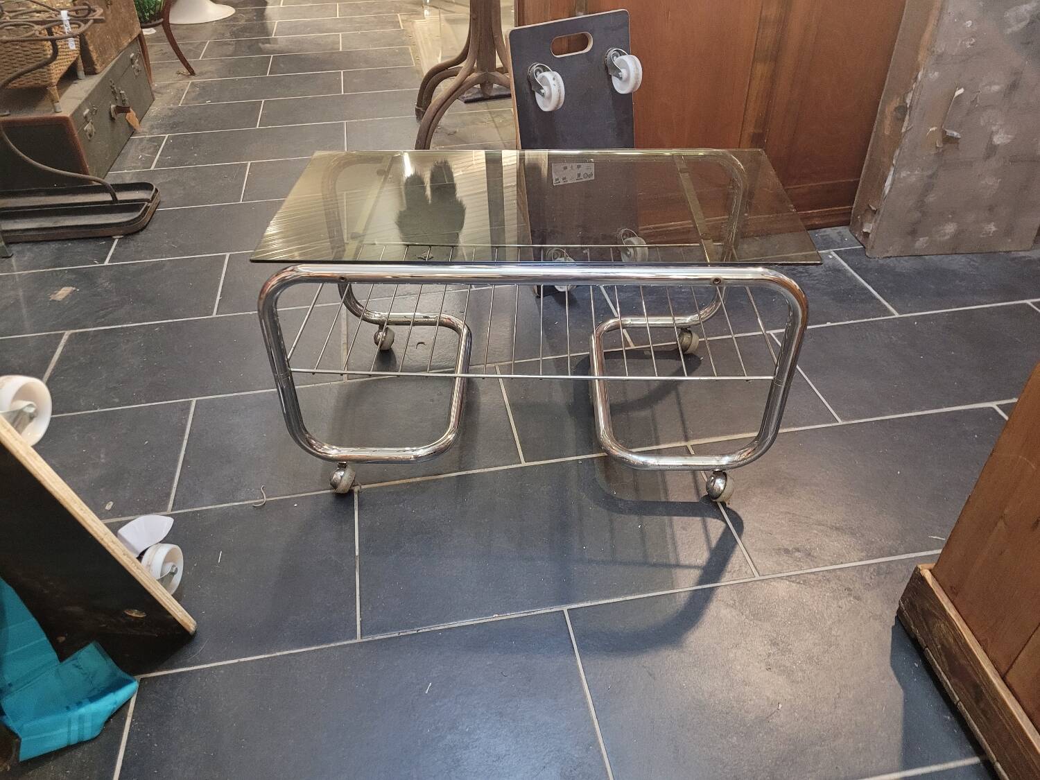 Coffee table with chrome base and smoked glass from the 70s