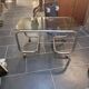 Coffee table with chrome base and smoked glass from the 70s
