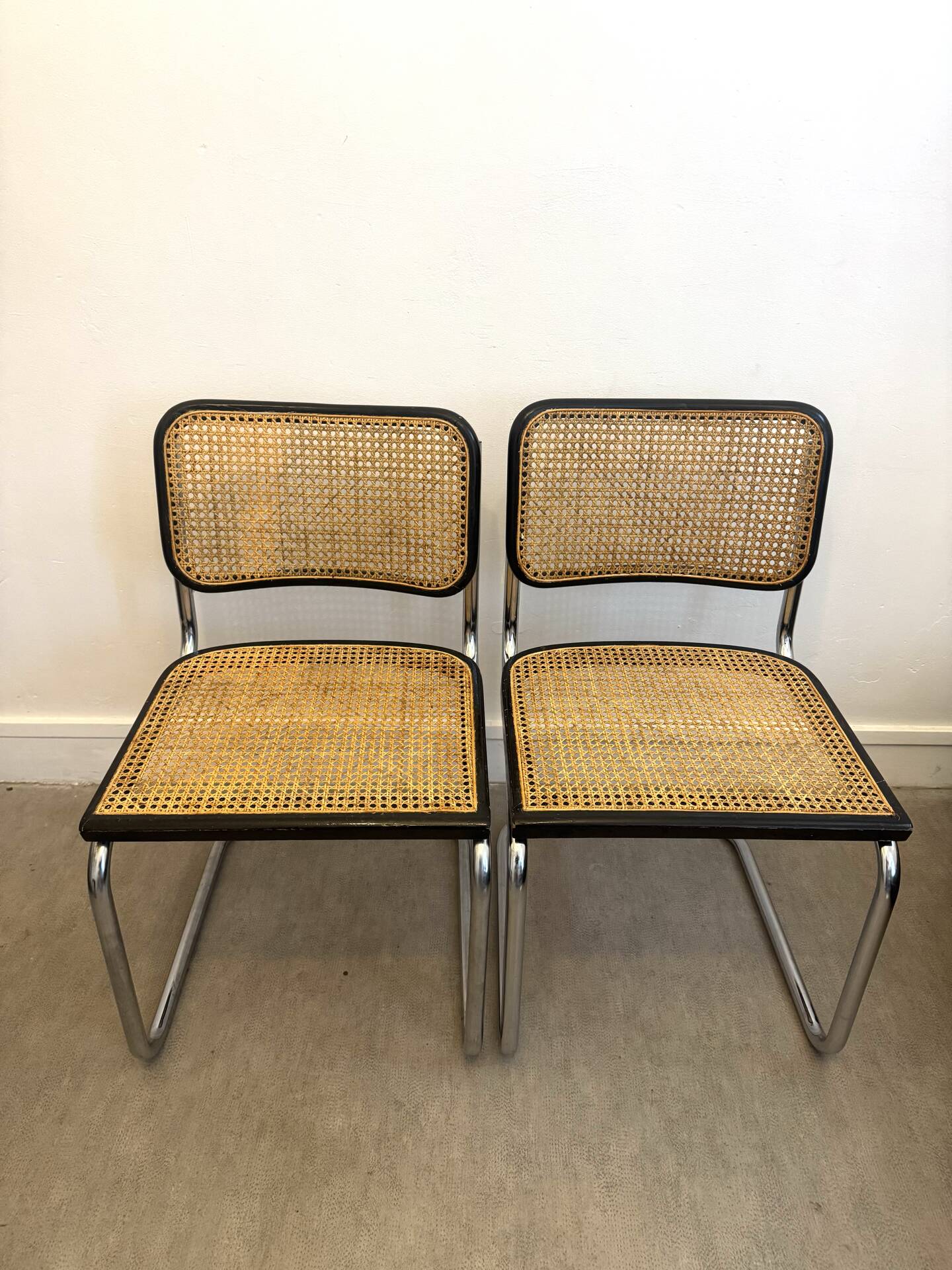 Pair of Marcel Breuer B32 Cesca chairs made in Italy.