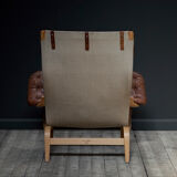 A Pernilla 69 leather lounge chair by Bruno Mathsson for Dux, 1969