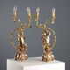 Pair of antique candelabra in carved and gilded wood, Italy, 20th century