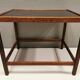 Smaller lamp/Side table of rosewood with black formica tabletop, designed by Kurt Østervig.