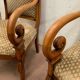 Paire de fauteuils de style Empire en hetre teinté xx siècle