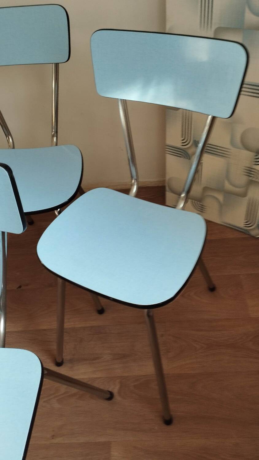 4 blue Formica chairs