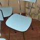 4 blue Formica chairs