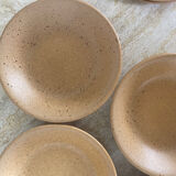 4 hollow plates in speckled stoneware