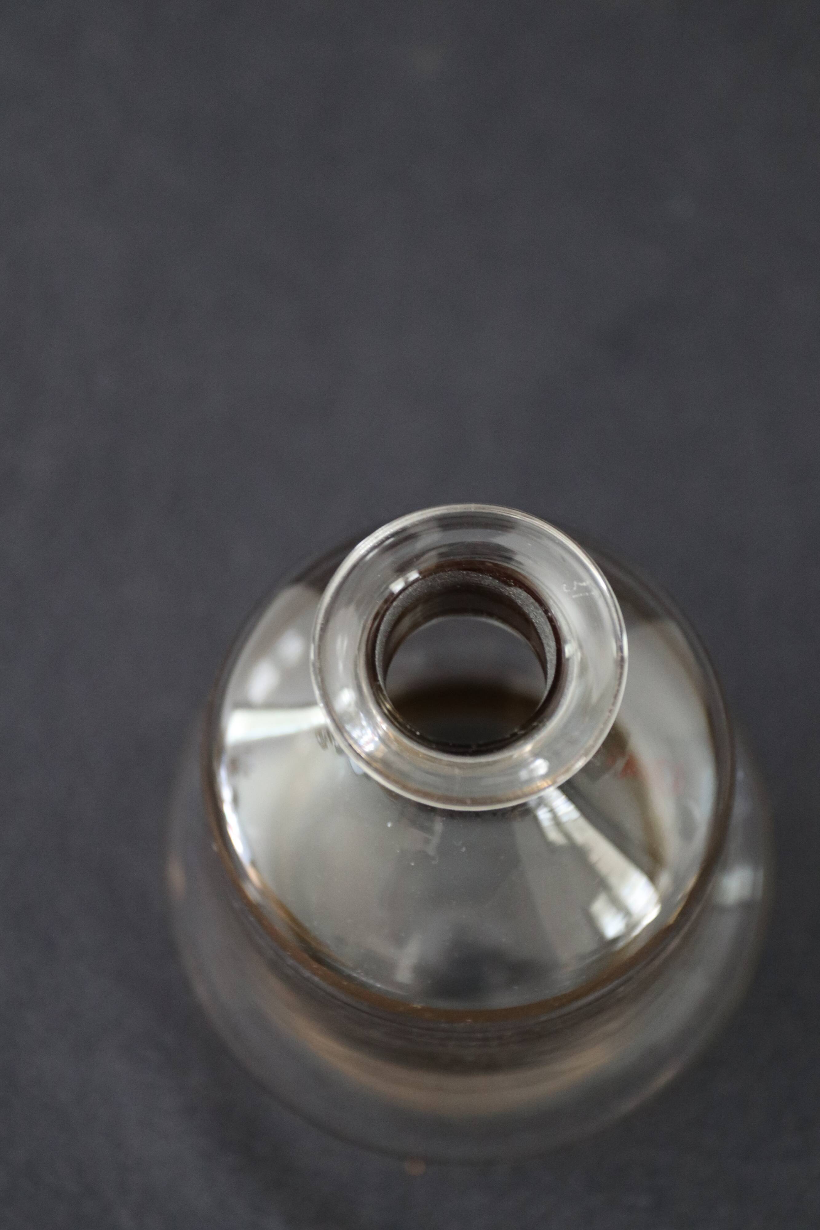 Glass liquor carafe decorated with gilded borders