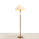 Paavo Tynell style floor lamp in brass and leather with linen shade