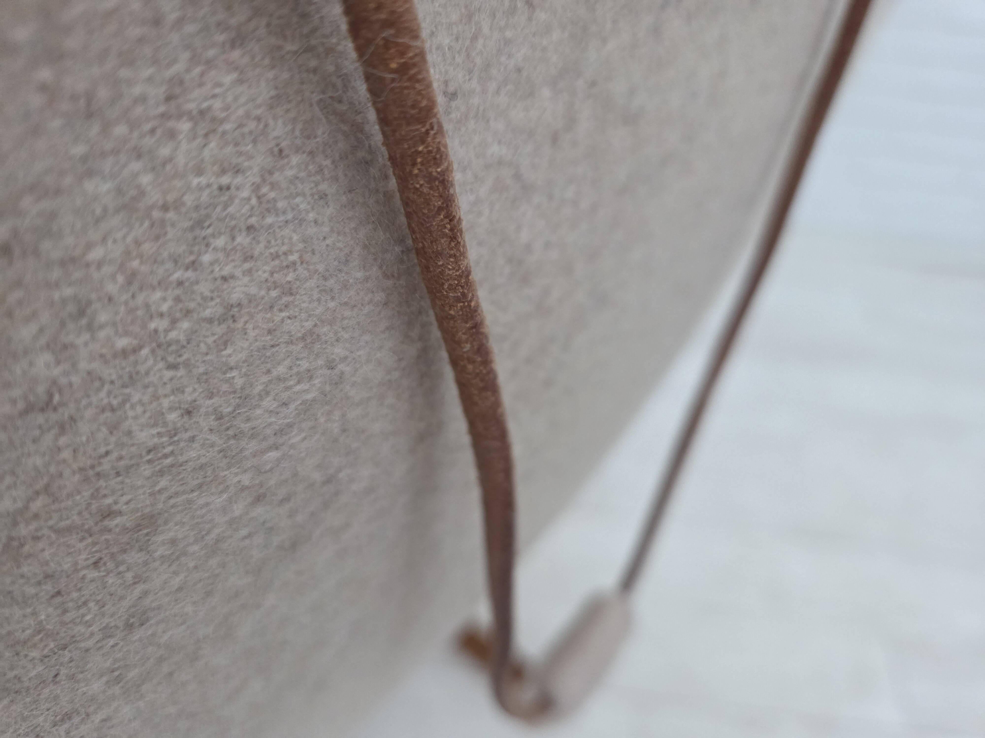 1970s, Danish rocking chair, reupholstered in quality genuine sheepskin.