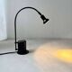Minimalist Memphis design arc table lamp from the 80s.