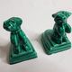Pair of dog-shaped dog-shaped art deco dogs in green dabbling