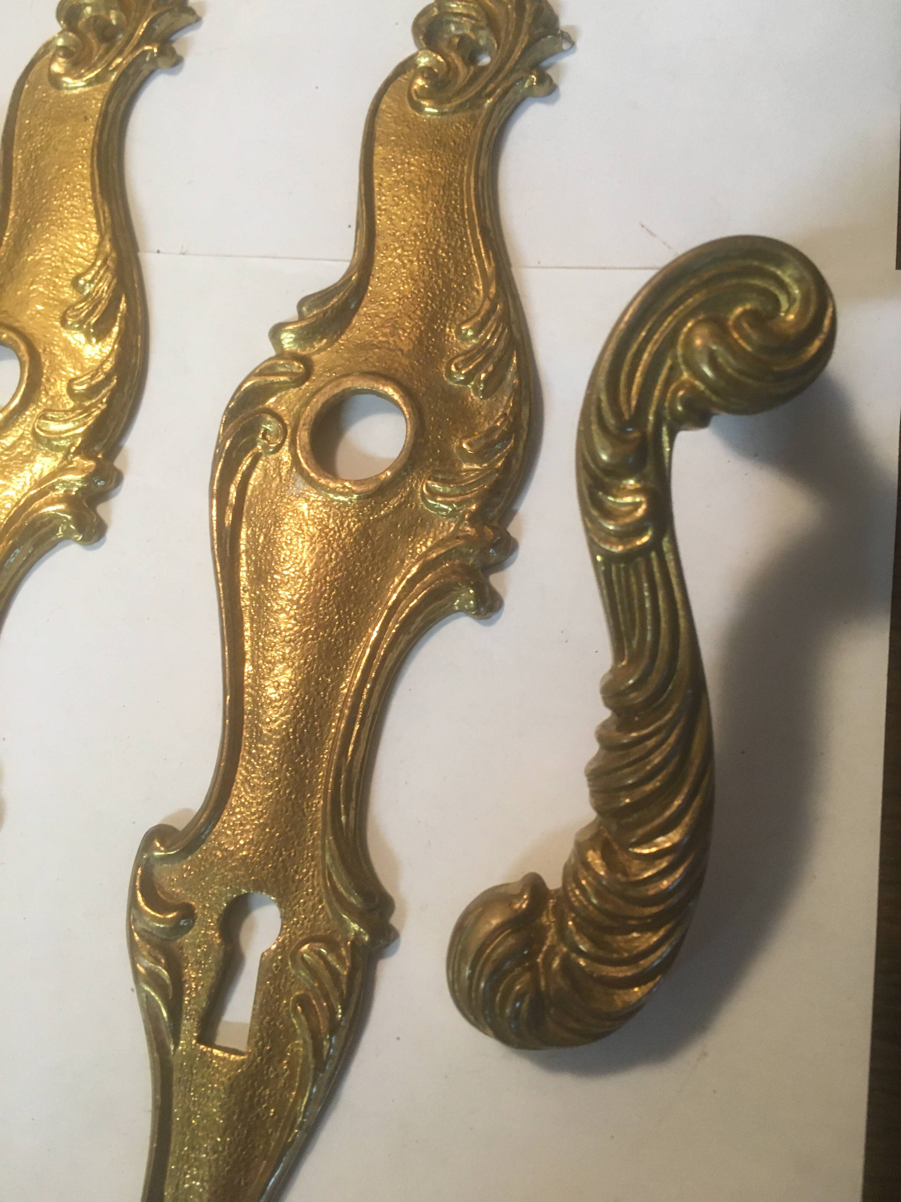 Louis xv style brass crutches and plaques