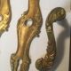 Louis xv style brass crutches and plaques