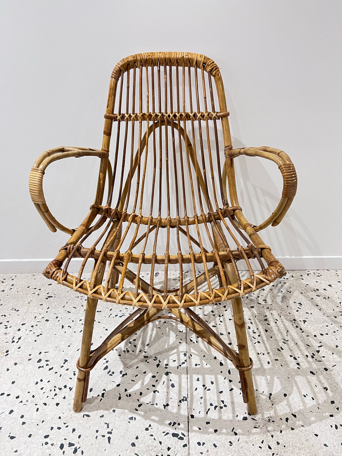 Six vintage rattan chairs