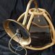 Wall sconces in rattan and smoked glass