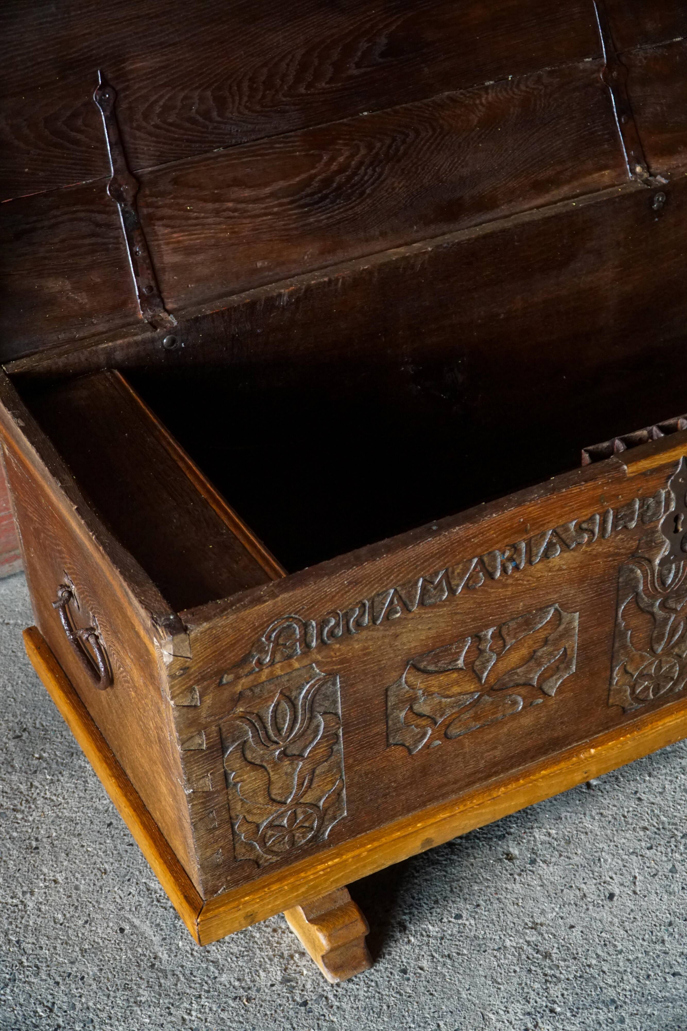 18th-century Scandinavian popular art oak chest with carved panels, dated 1764.