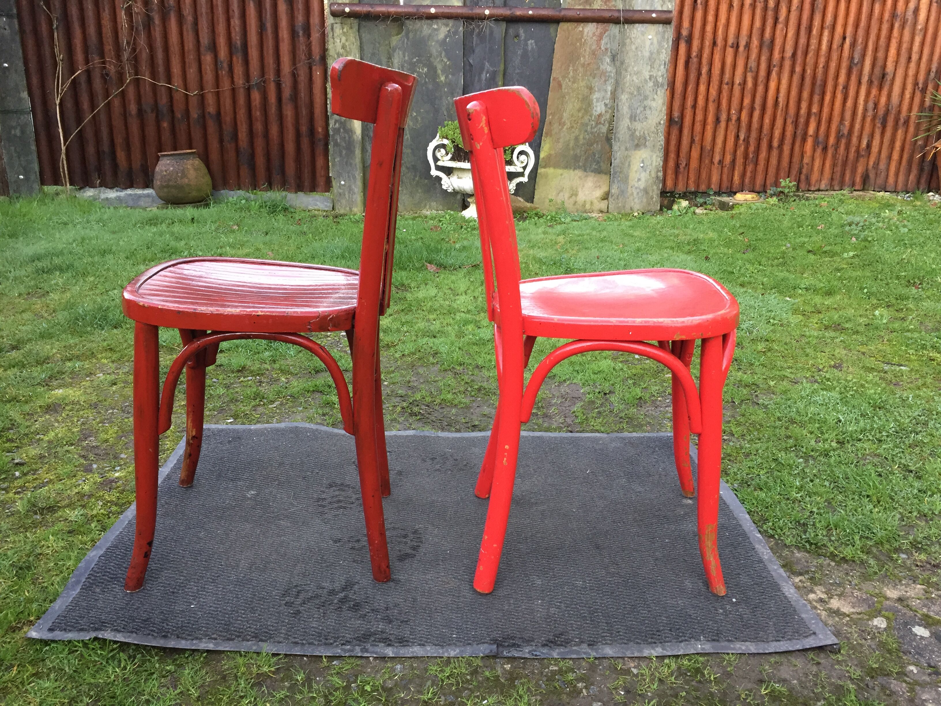 Vintage bistro chairs painted in burgundy and red