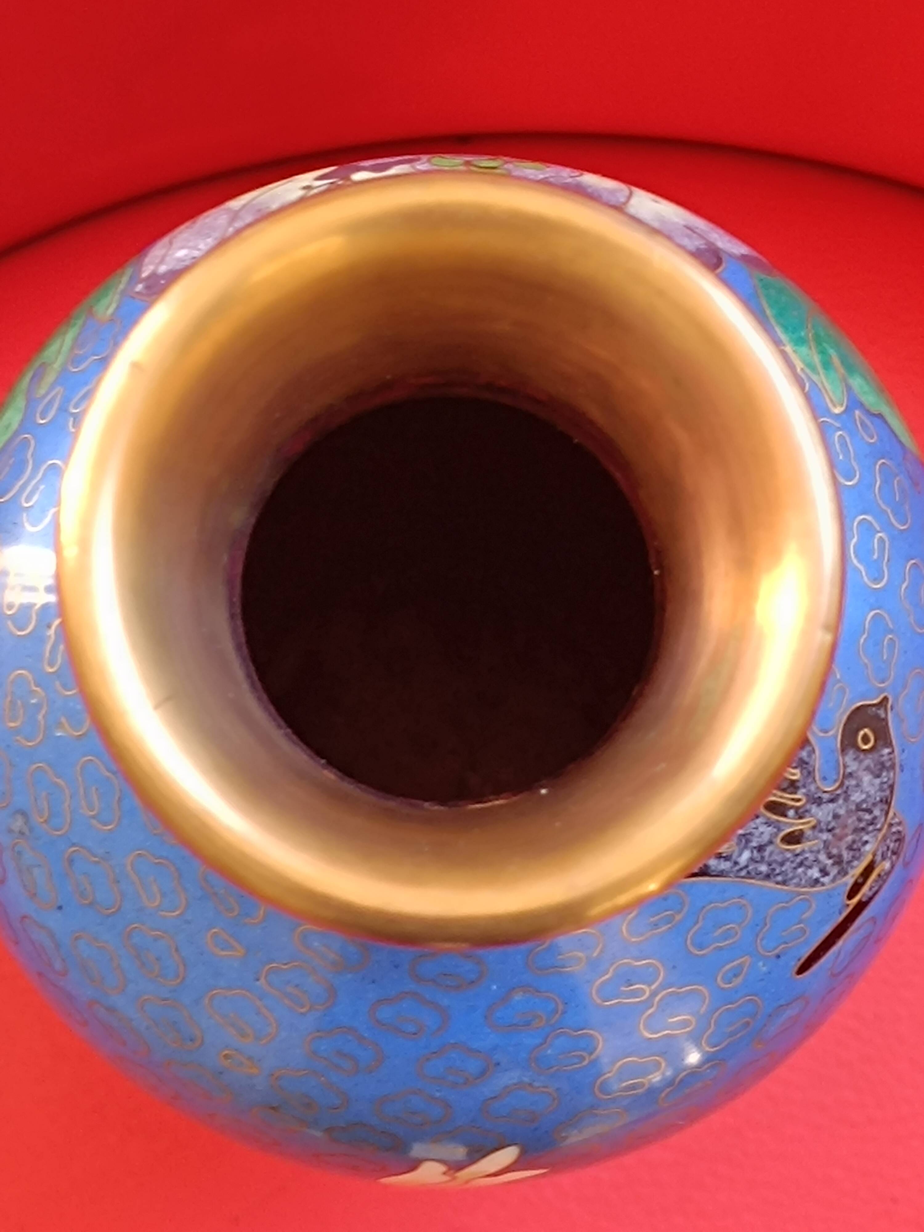 Chinese enamelled vase on copper on a base. Shades of blue.